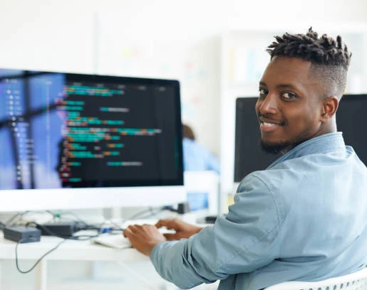 A Sentry Systems developer writing custom software.